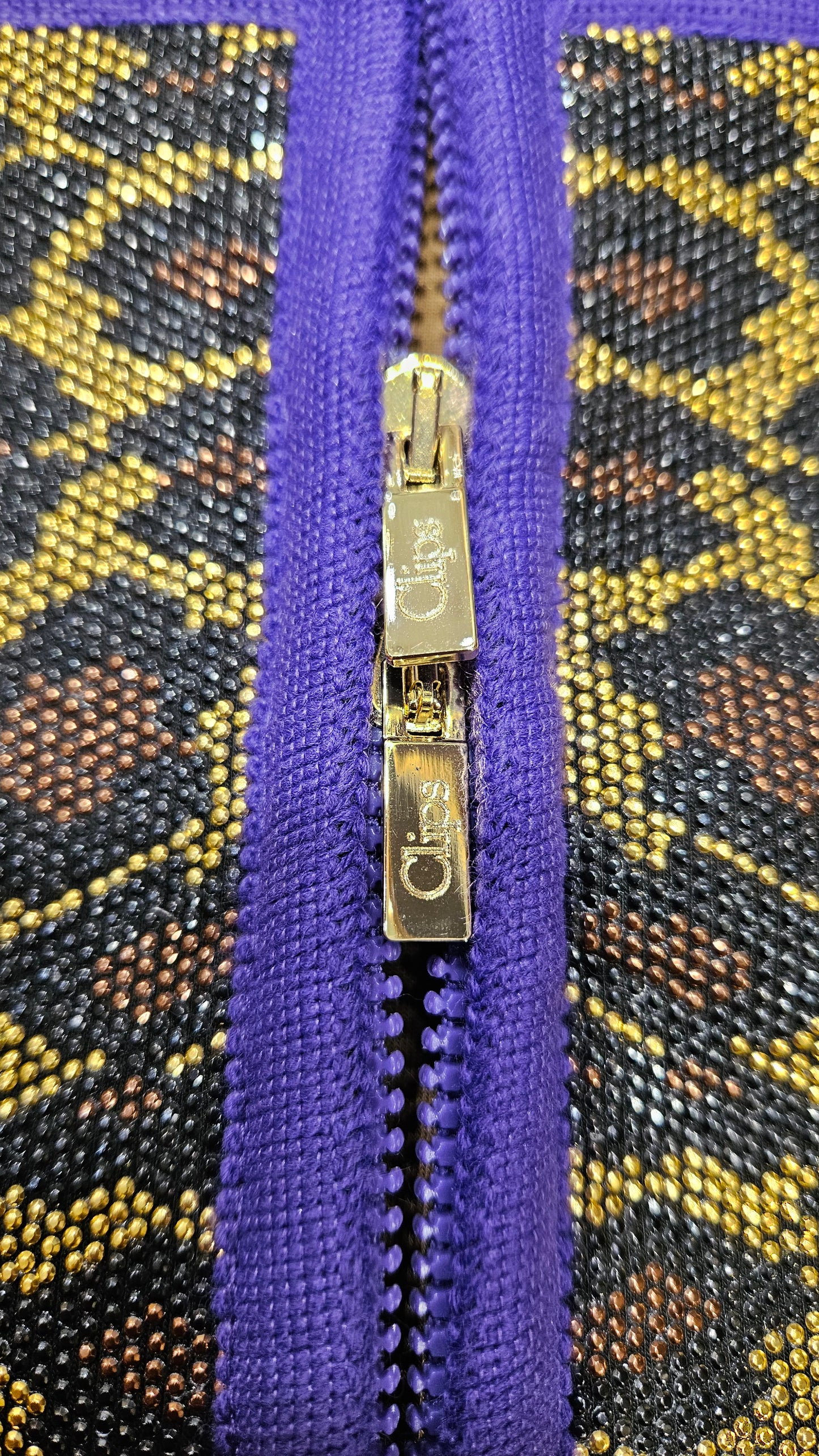 Giacca zip neoprene Clips nera e viola animalier