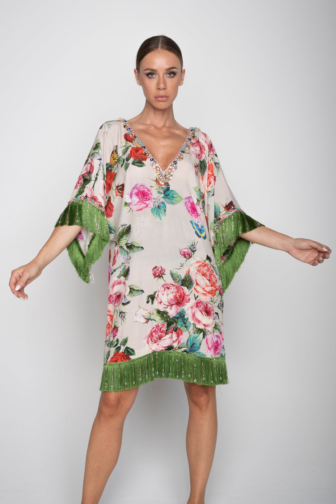 Casacca floreale ricamata con frange